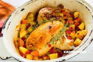 Chicken in an oven with vegetables