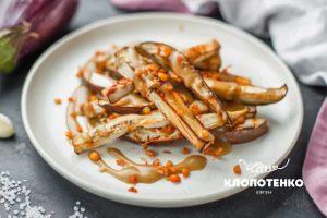 Баклажани з грибним соусом