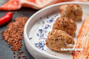 Hrechanyky with tomato sauce