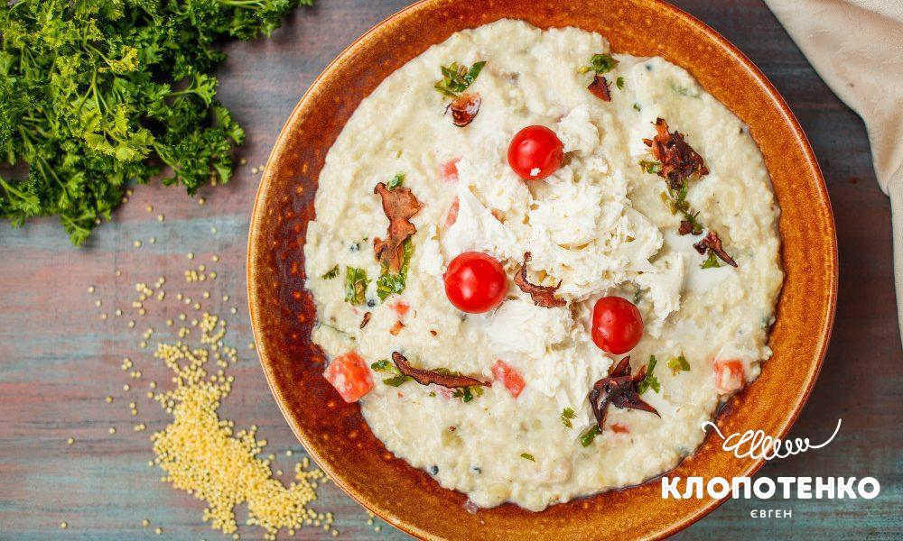 Kulish (savory millet porridge) with sour pickled tomato and mozzarella