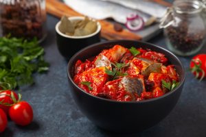 оселедець в томаті